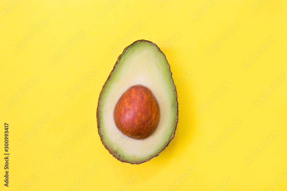 open natural avocado isolated on color background