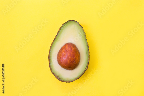 open natural avocado isolated on color background