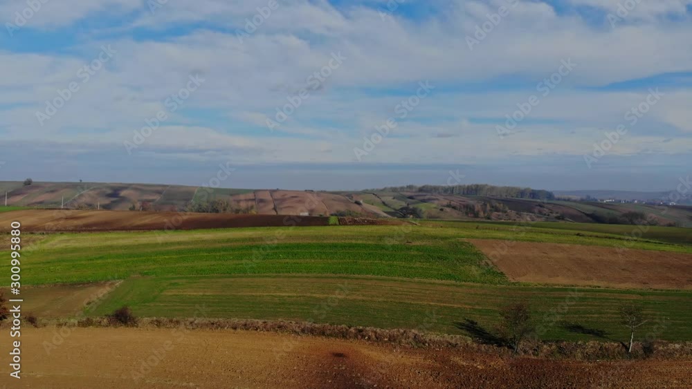 A flight over cultivated fields in the light of the autumn sun. A flight over cultivated fields in the light of the autumn sun.