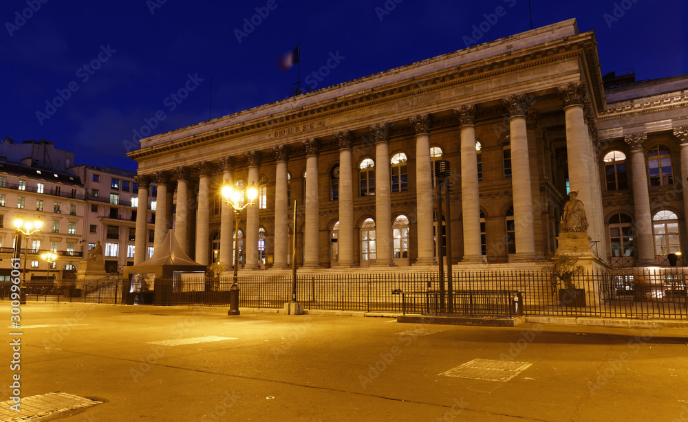 Fototapeta premium The Bourse of Paris- Brongniart palace at night,Paris, France.