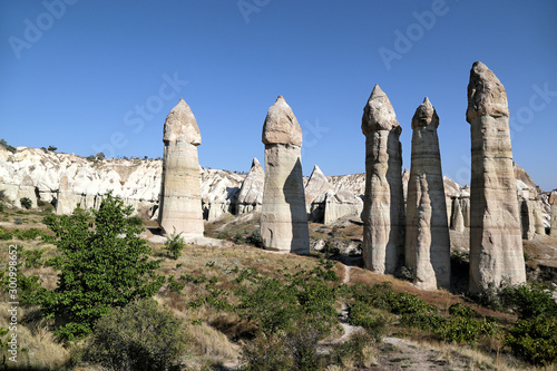 Unusually shaped volcanic cliffs in the Valley of Love in the Cappadocia region of Turkey.