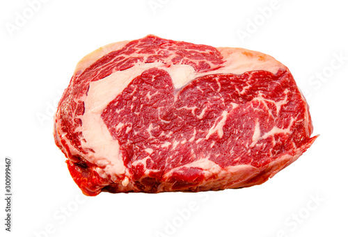 Konstfotografi A rib eye steak of marbled grain-fed beef lies on a white background