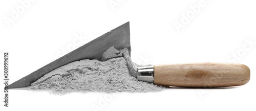 Cement pile and trowel isolated on white background