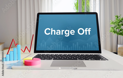 Charge Off – Statistics/Business. Laptop in the office with term on the display. Finance/Economics.