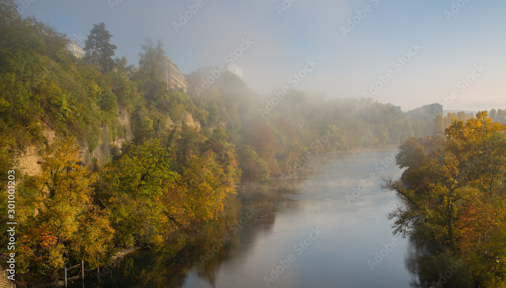 Aerial view fog of Leman lake in autumn leaves   - Geneva city in Switzerland,