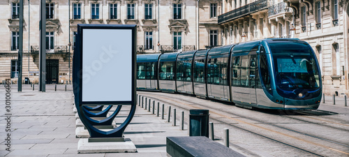 Fototapeta Naklejka Na Ścianę i Meble -  Line of clear billboards on city street with blank copy space screen for advertising or promotional poster content, empty mockup Lightboxes for information, blank displays outdoors in urban area