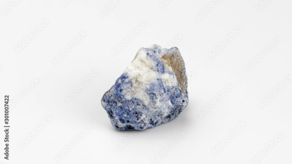 Mineral sodalite on a white background. Mineral sodalite on a white background.