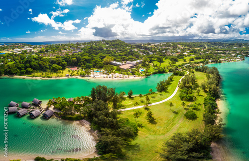 Fototapeta Naklejka Na Ścianę i Meble -  Port Vila, Vanuatu - April 3 2019: Aerial drone view of Holiday Inn Resort Vanuatu, Port Vila, popular holidaymakers resort.