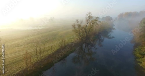 Aerial view of river under morning fog, Ukraine photo