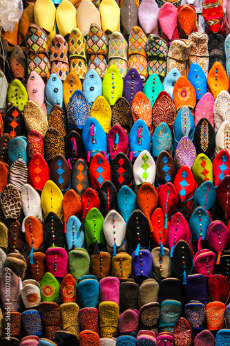 detail of slippers for sale in a shop of the souk market in Marrakesh, Morocco