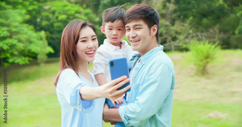 Young parent take selfie with child Young parent take selfie with child