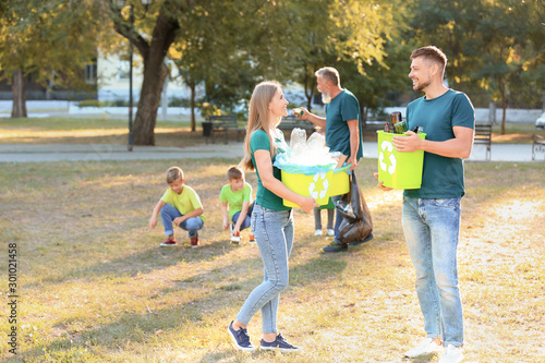 People gathering garbage ou...