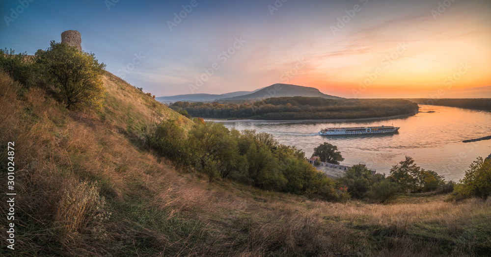 Devin Castle Ruin over Danube River near Bratislava, Slovakia at Sunset Devin Castle Ruin over Danube River near Bratislava, Slovakia at Sunset