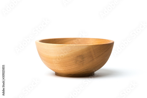 Empty wooden bowl isolated on white background photo