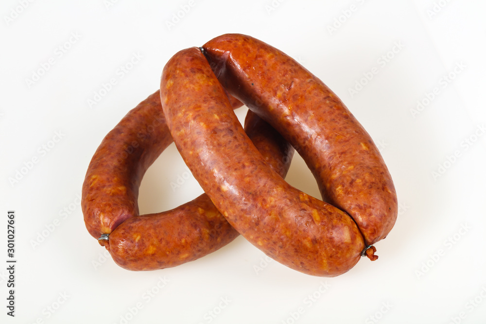 Tasty meat sausages over white background Tasty meat sausages over white background