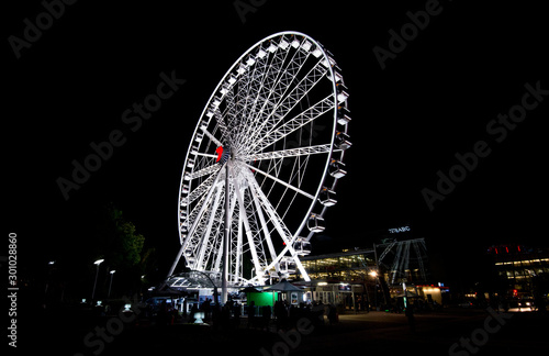 ferris wheel with bright lights at night - Brisbane eye 
