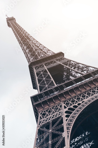 Beautiful view of Eiffel tower in Paris, France. Famous touristic places in Europe. European city travel concept.