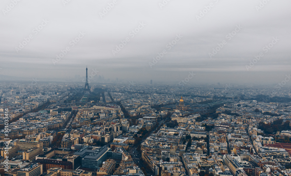 Aerial panorama of Paris City in late autumn from Maine-Montparnasse Tower