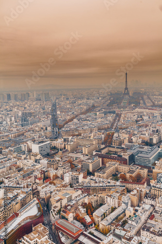 Aerial panorama of Paris City in late autumn from Maine-Montparnasse Tower at sunset. © bluebeat76