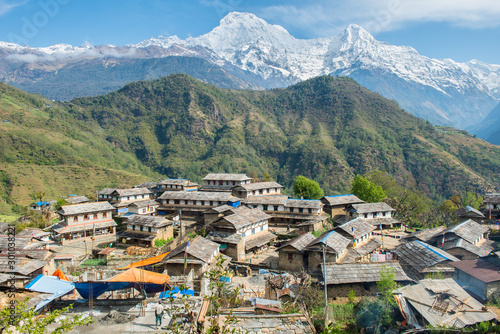 View of Annapurna range includes Annapurna South and Mt.Himchuli view from Ghandruk village in northern-central of Nepal. Ghandruk is most popular for wonderful Gurung culture in Nepal. photo