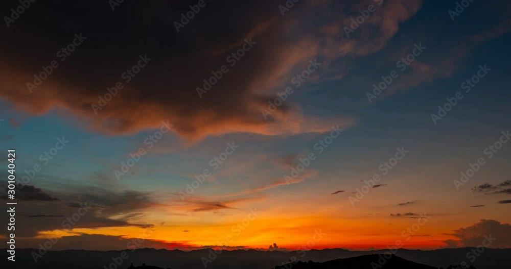 Time lapse clouds sky during sunset over the mountains. Jib effect. Time lapse clouds sky during sunset over the mountains. Jib effect.