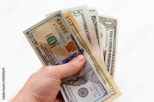 USA dollars bills in hand. Paper money in hand