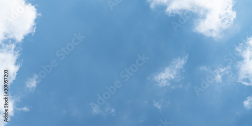 white cloud and blue sky background with copy space