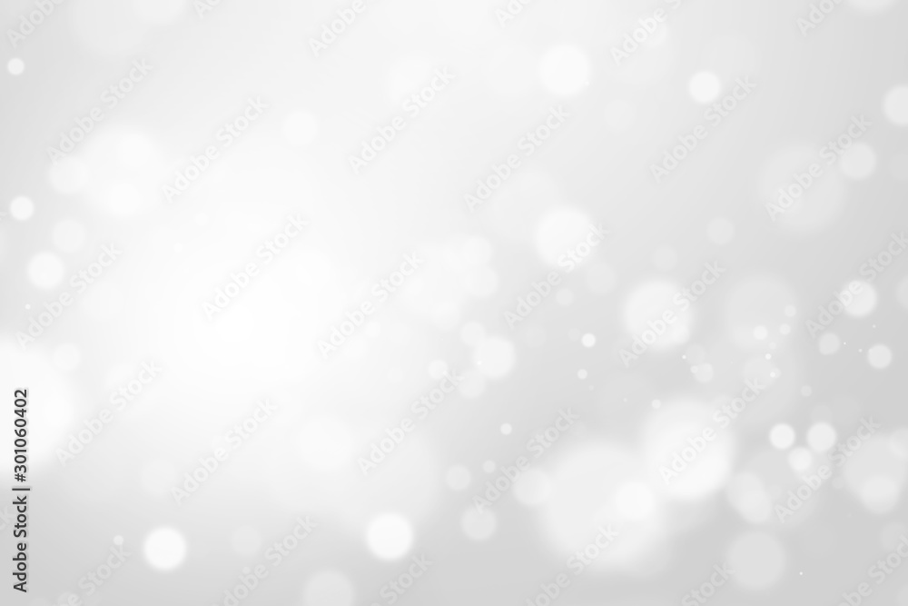 Bokeh abstract blurred silver and white beautiful background. Soft color light glitter sparkles. element for backdrop or design cosmetic ads, winter, christmas, luxury, beauty, baby