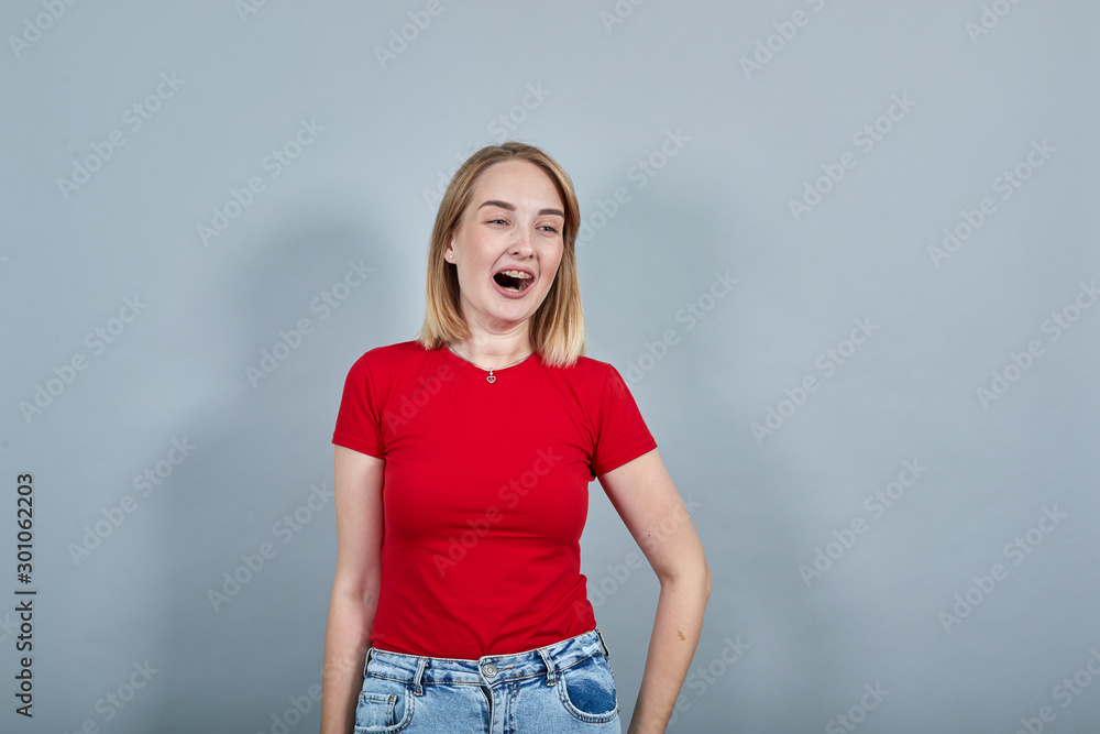 Portrait of sleepy tired young woman in casual clothes yawning isolated on grey turquoise wall background in studio. People sincere emotions, lifestyle concept Portrait of sleepy tired young woman in casual clothes yawning isolated on grey turquoise wall background in studio. People sincere emotions, lifestyle concept