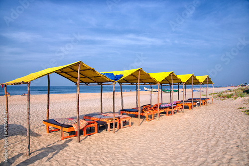 Sun umbrellas and chairs on beach