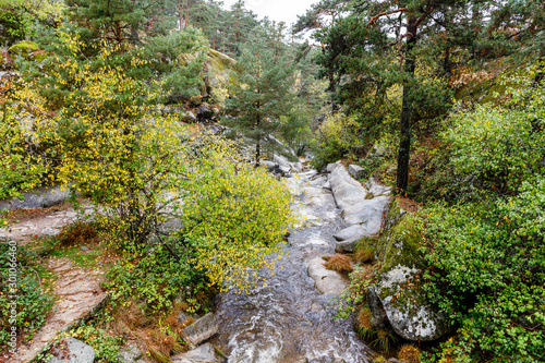 Eresma river as it passes through Boca del Asno among the granite rocks in Valsain, Segovia, Spain