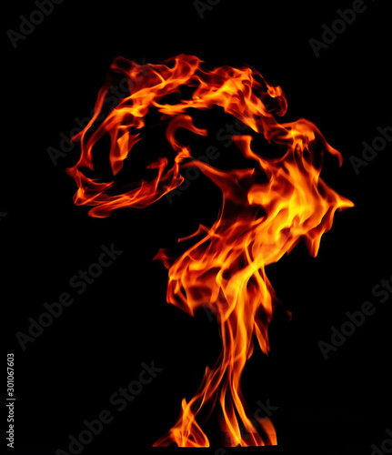 Fire question. Fire flame isolated on black background. Beautiful orange, red, yellow blaze fire flames.