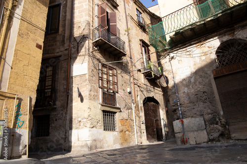 Palermo  Italy  September 19  2019  Confluence of several streets with old and poorly preserved buildings with wrought iron details on windows and balconies in Palermo