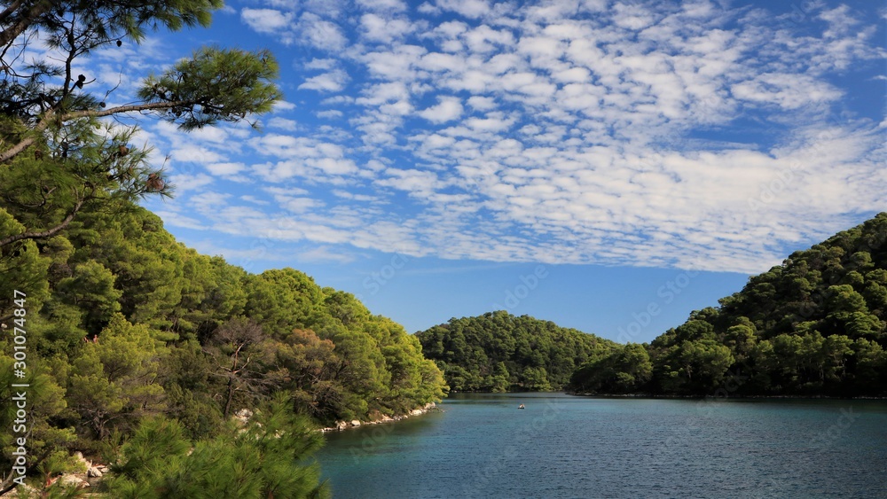 panoramic view to the blue salt water lake and green pine forest, national park, Mljet Island,  Croatia