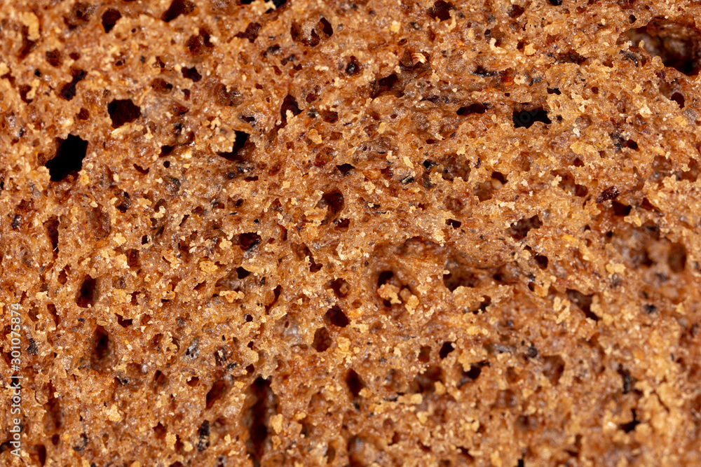 Black rye bread as an abstract background Black rye bread as an abstract background