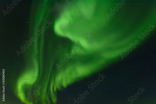 Aurora at night in the sky in the north. © Moroshka