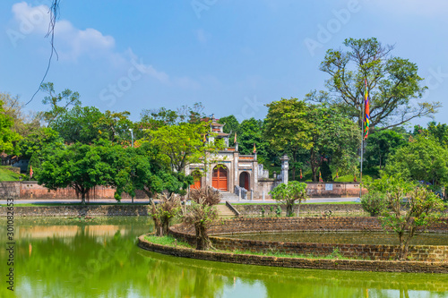 Scenery of Thuong shrine with lake and traditional well in ancient Co Loa citadel, Vietnam. Co Loa was capital of Au Lac (old Vietnam), the country was founded by Thuc Phan about 2nd century BC.