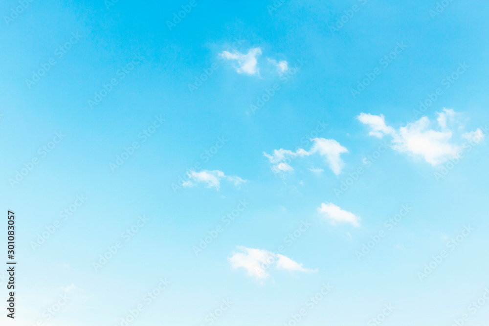 Fluffy white clouds flying on blue sky background Fluffy white clouds flying on blue sky background