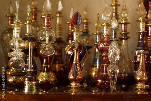 old and antique Perfume bottles used in meddle East and Iran , Bottles For Ancient Medicine. Flasks and Vials For Liquid Chemicals . lots of vintage, collection of colorful old glass bottles, 