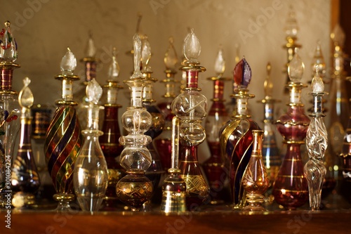 old and antique Perfume bottles used in meddle East and Iran , Bottles For Ancient Medicine. Flasks and Vials For Liquid Chemicals . lots of vintage, collection of colorful old glass bottles, 