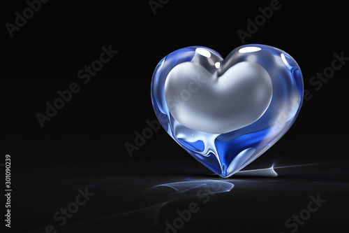 Blue Glass Heart with Light Effect on black background. Love and Romantic concept