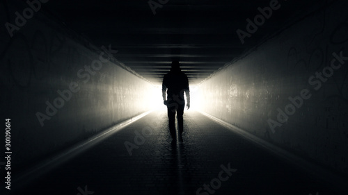 Man walking in Tunnel to the Light © Rashevskyi Media