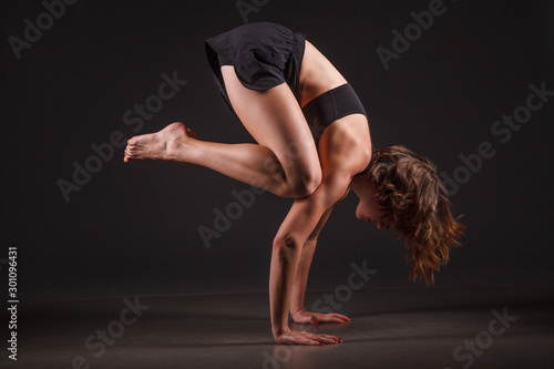 young girl doing yoga