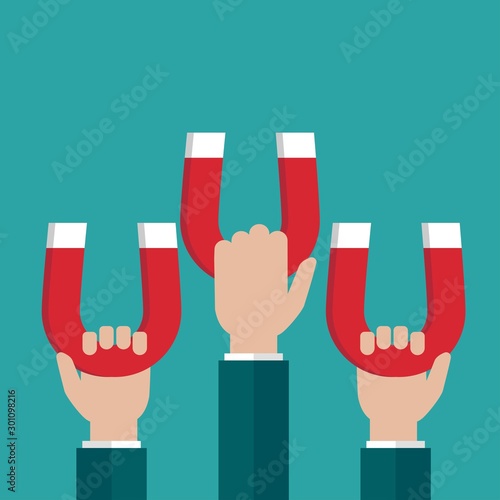 Hands with red horseshoe magnets. Businessman attracting money, customers, investment success.