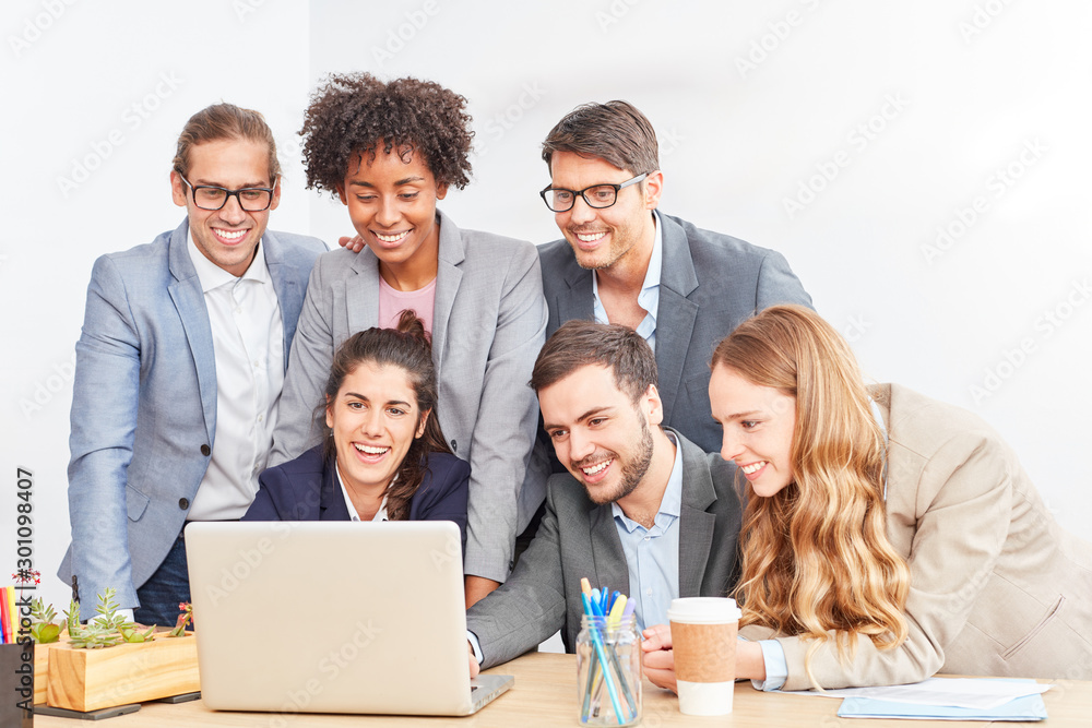Start-up team with laptop during a video conference Start-up team with laptop during a video conference