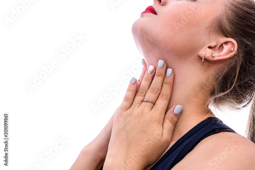 Woman with hands on throat. Pain concept isolated on white