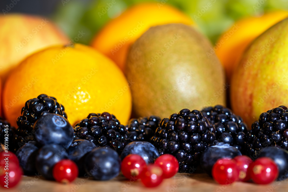 closeup, variety of fresh fruits for a smoothie or juice closeup, variety of fresh fruits for a smoothie or juice