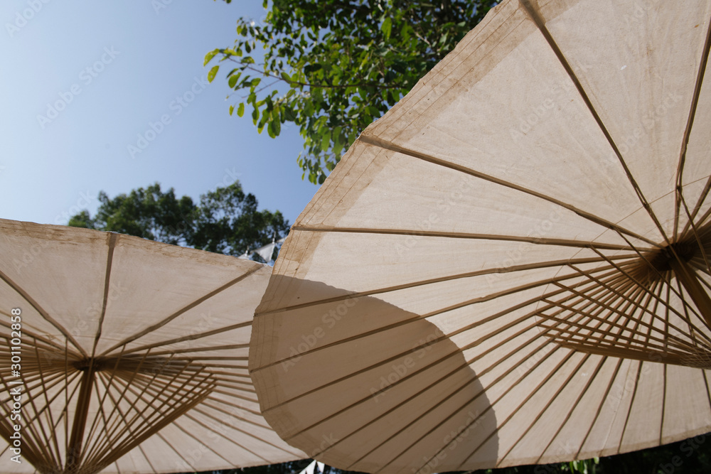 Fototapeta premium umbrella on background of blue sky