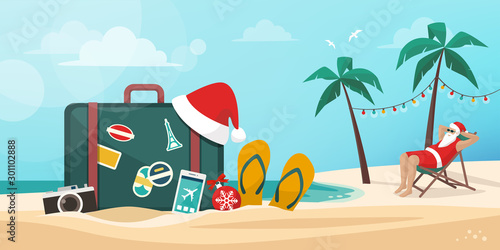 Santa Claus having a vacation on the beach