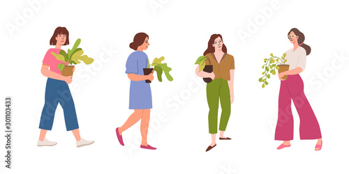 Vector set of character illustrations in simple flat style - girls holding house plants in pots - urban jungle concept © venimo